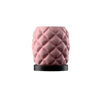 Modern puffer-style lamp, pink quilted padding design, black base