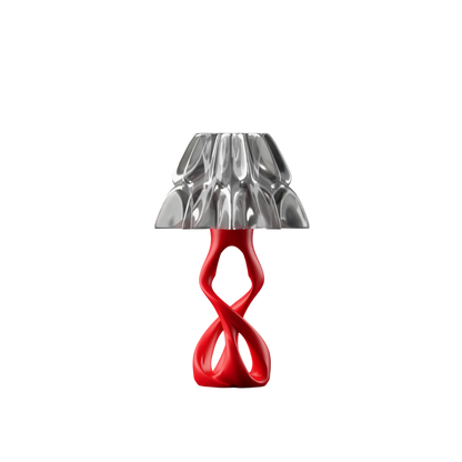 Table lamp with a red base and translucent lampshade on a white background